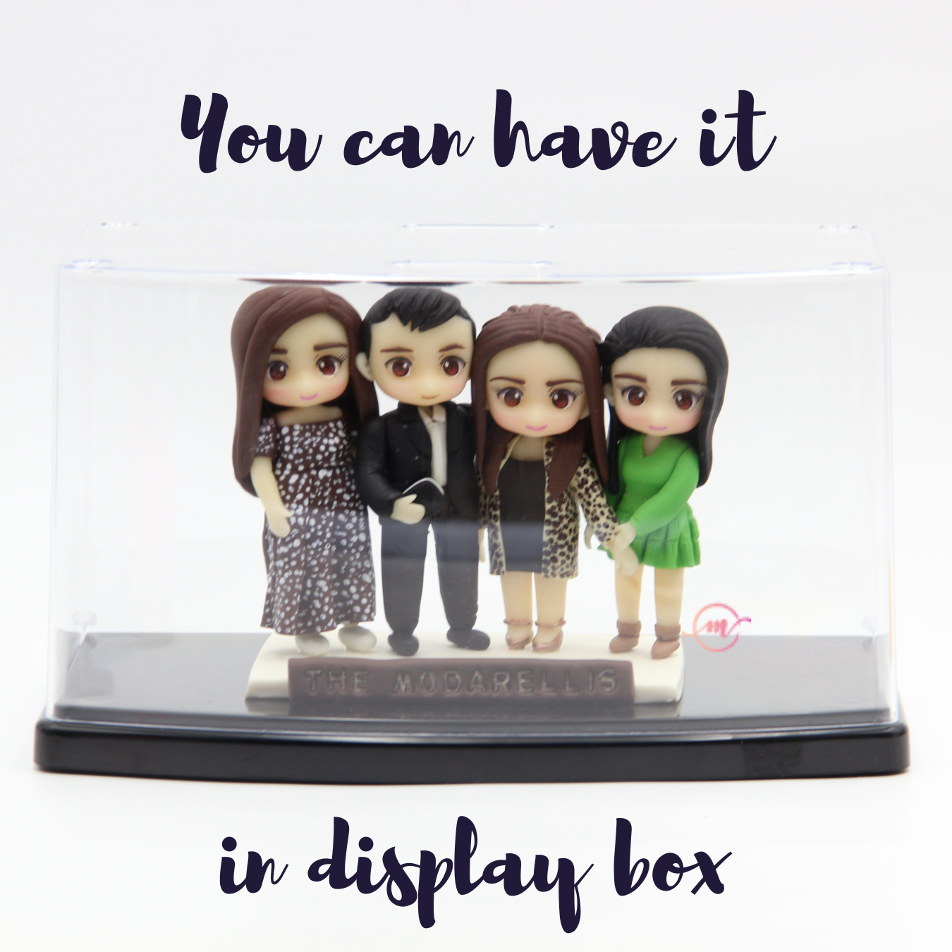 Family Figurines in Display Case