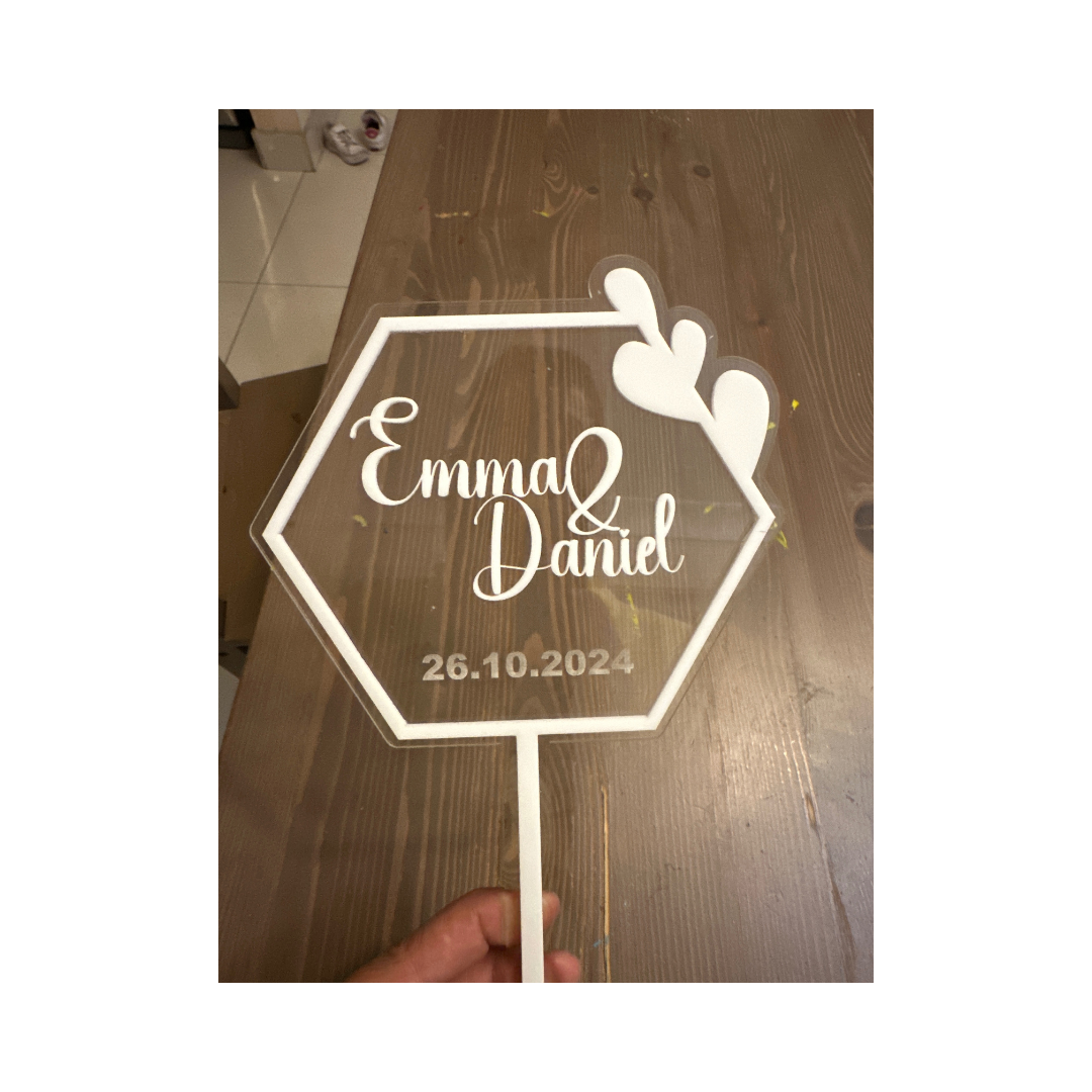 Custom laser-cut acrylic cake toppers
