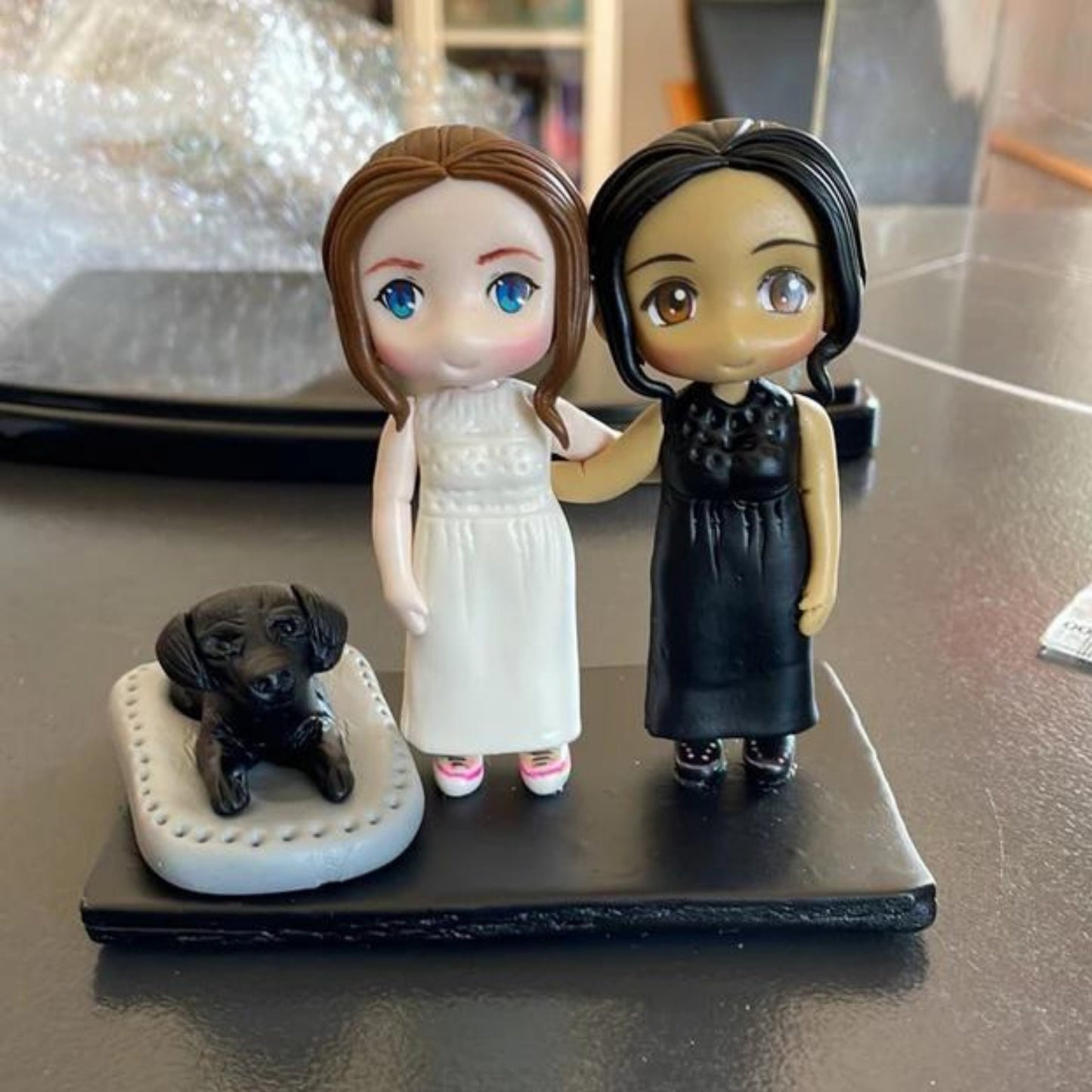 Custom made air dry clay figurine cake topper for weddings, birthdays and special occasions