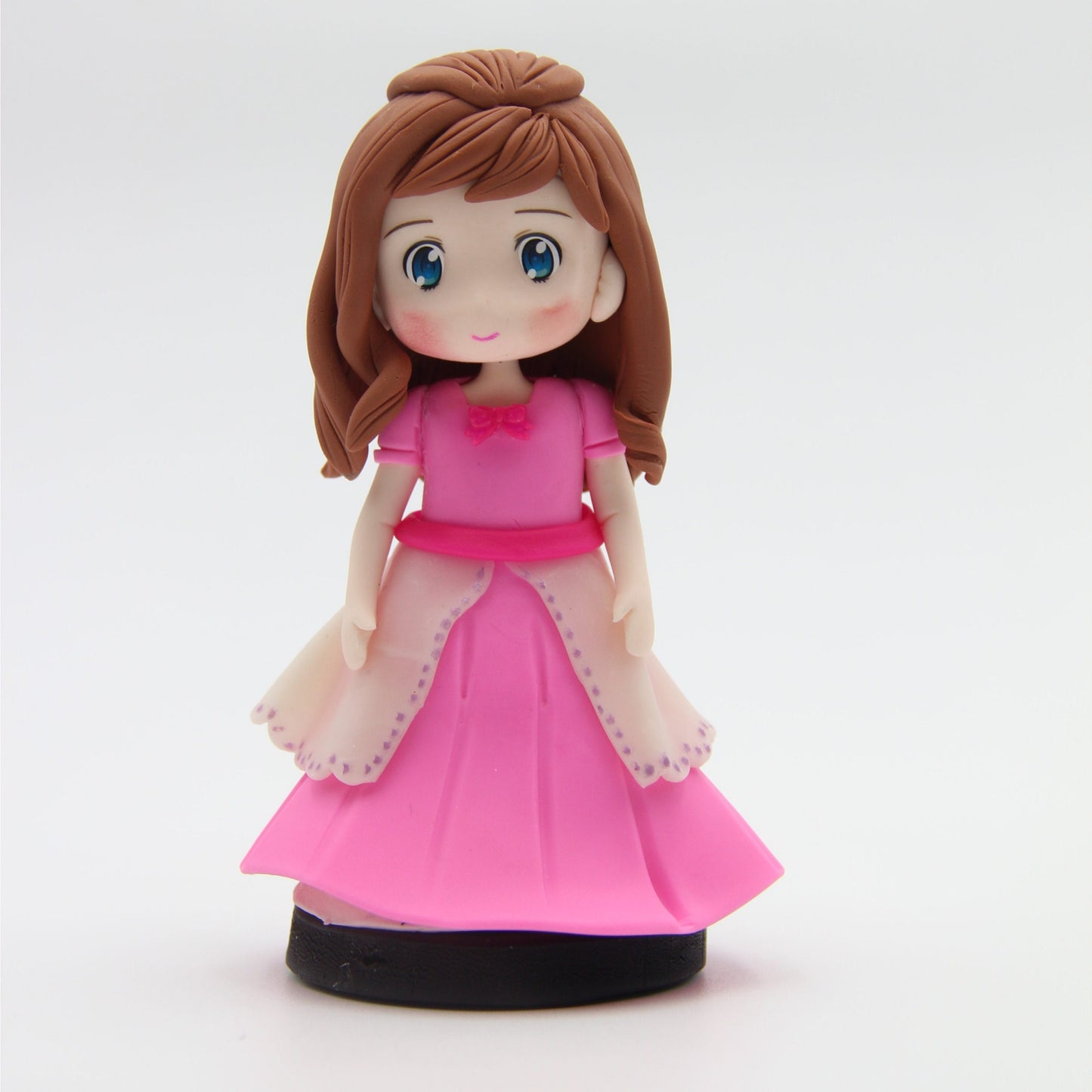 Custom made air dry clay figurine cake topper for weddings, birthdays and special occasions
